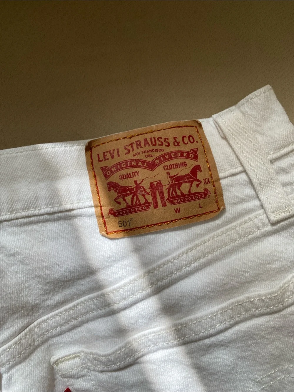 Levi's White Frayed Denim Shorts